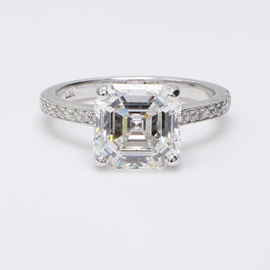 0.30 CTW Round 14 K White Gold Side Stone Engagement Ring