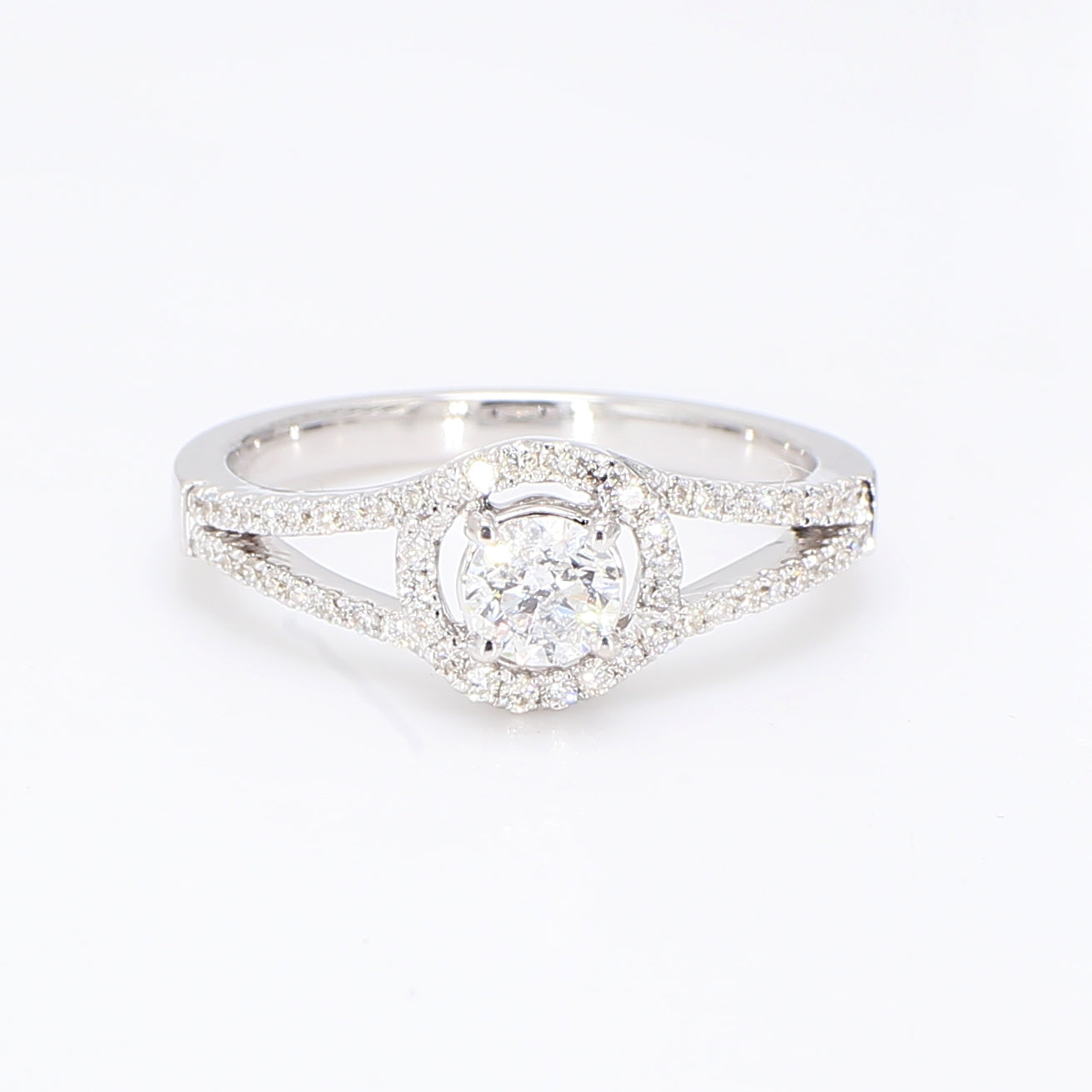 0.65 CTW Round 18 K White Gold Halo Engagement Ring