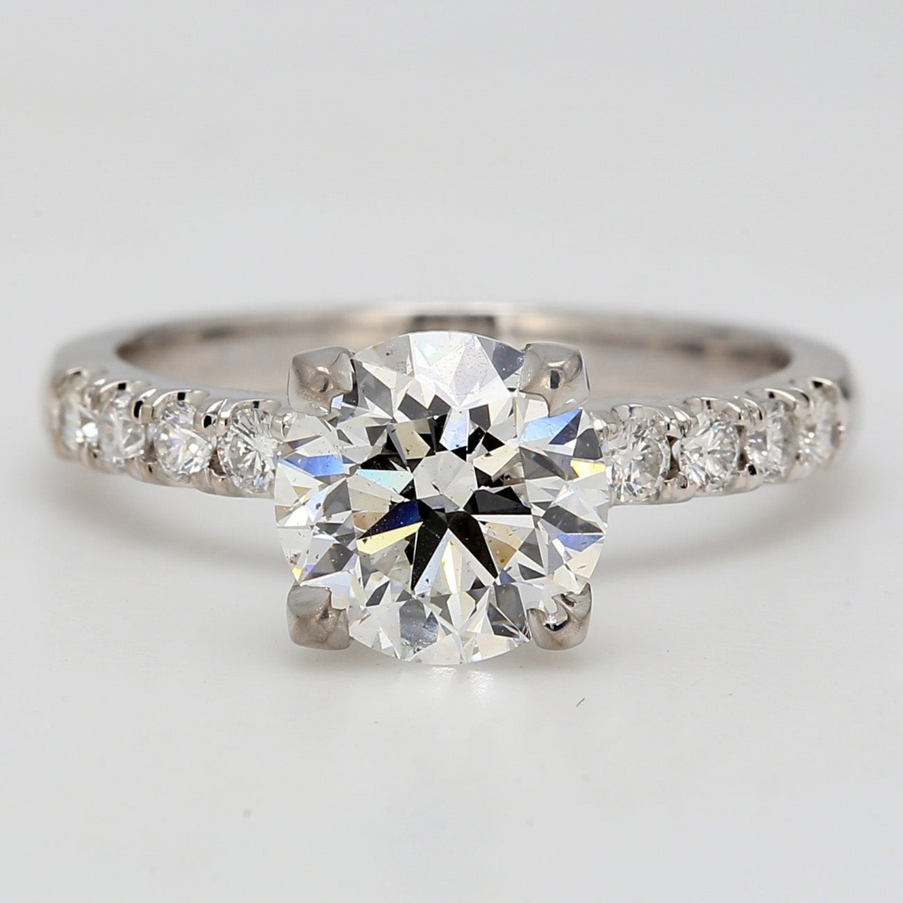 0.34 CTW Round 14 K White Gold Side Stone Engagement Ring