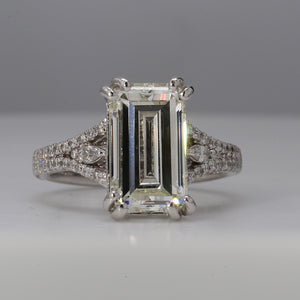 0.64 CTW Platinum Side Stone Engagement Ring