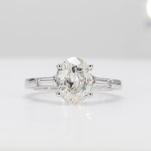 0.20 CTW Tapered Baguette 14 K White Gold Three Stone Engagement Ring